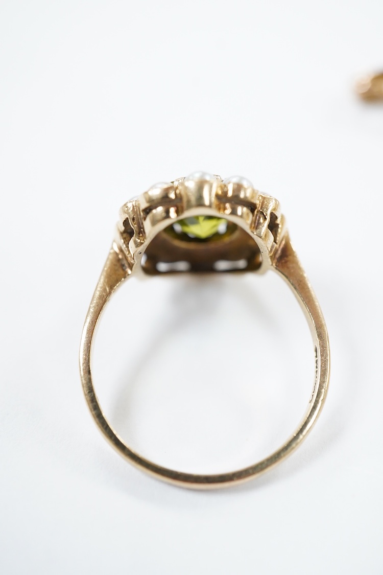A yellow metal stick pin, the terminal modelled as a Knight's arm holding a scroll(a.f.), 79mm, together with two pairs of yellow metal and gem set ear clips including 9ct and opal doublet.